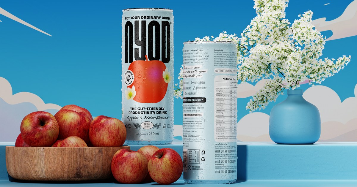 NYOD Apple & Elderflower can, styled with apples and elderflowers