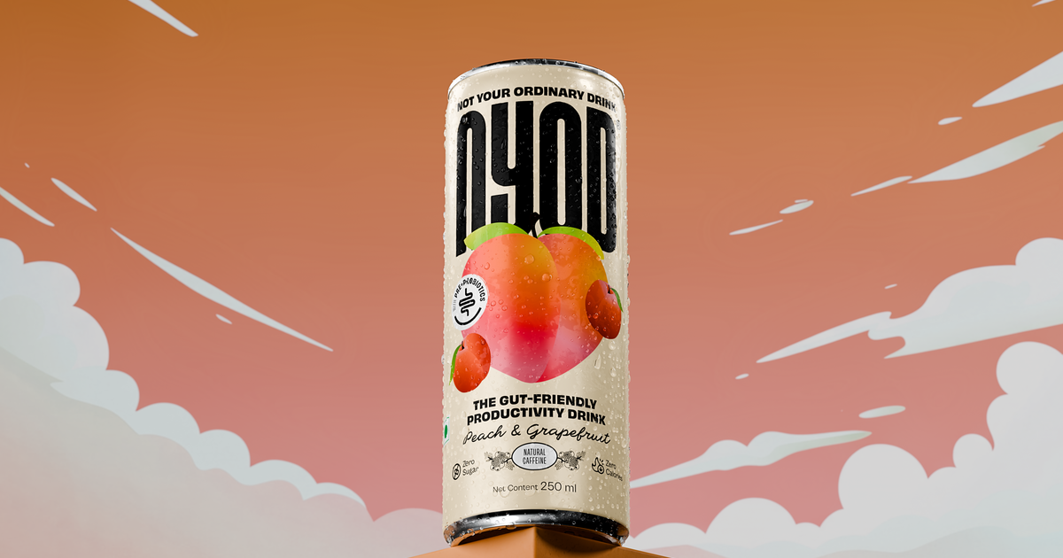 Can of NYOD Peach & Grapefruit with caffeine and L-theanine, against an orange sky